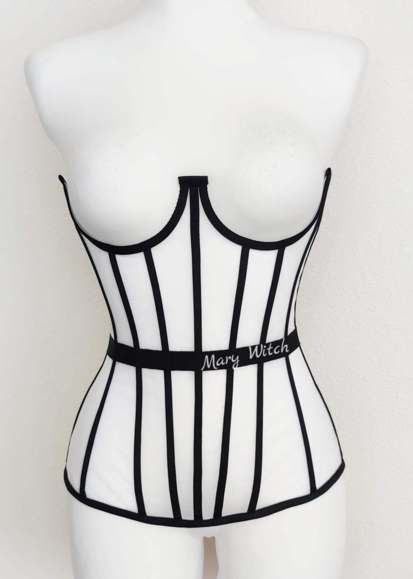 Beige underbust corset with black lines