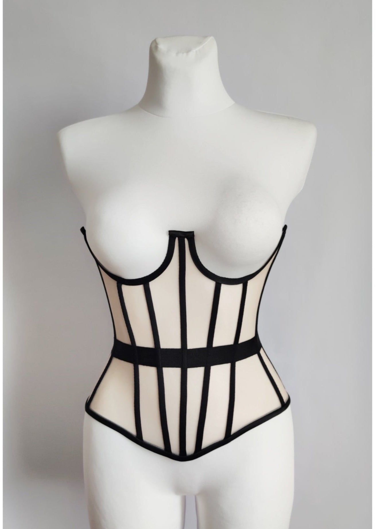 Beige underbust corset with black lines